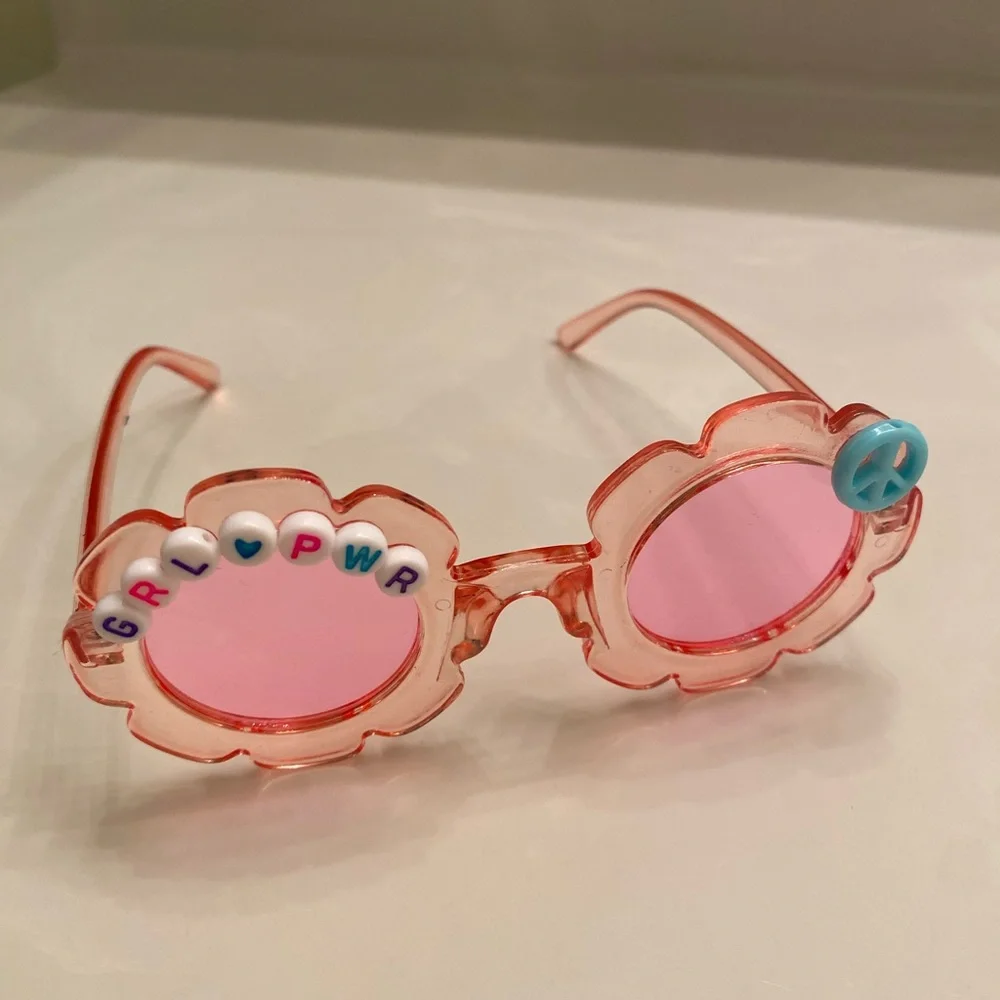 Girls pink see through flower shaped grl pwr sunglasses